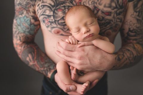 baby safe in dads hands