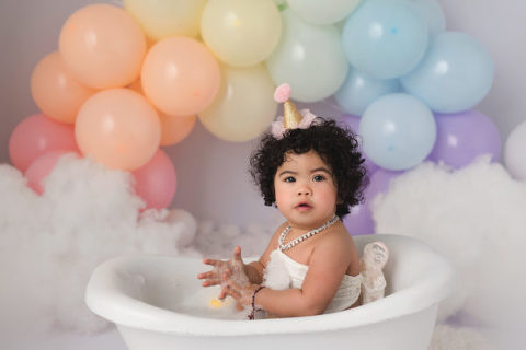 Rainbow and unicorn cake smash at June Bug Photography Studio